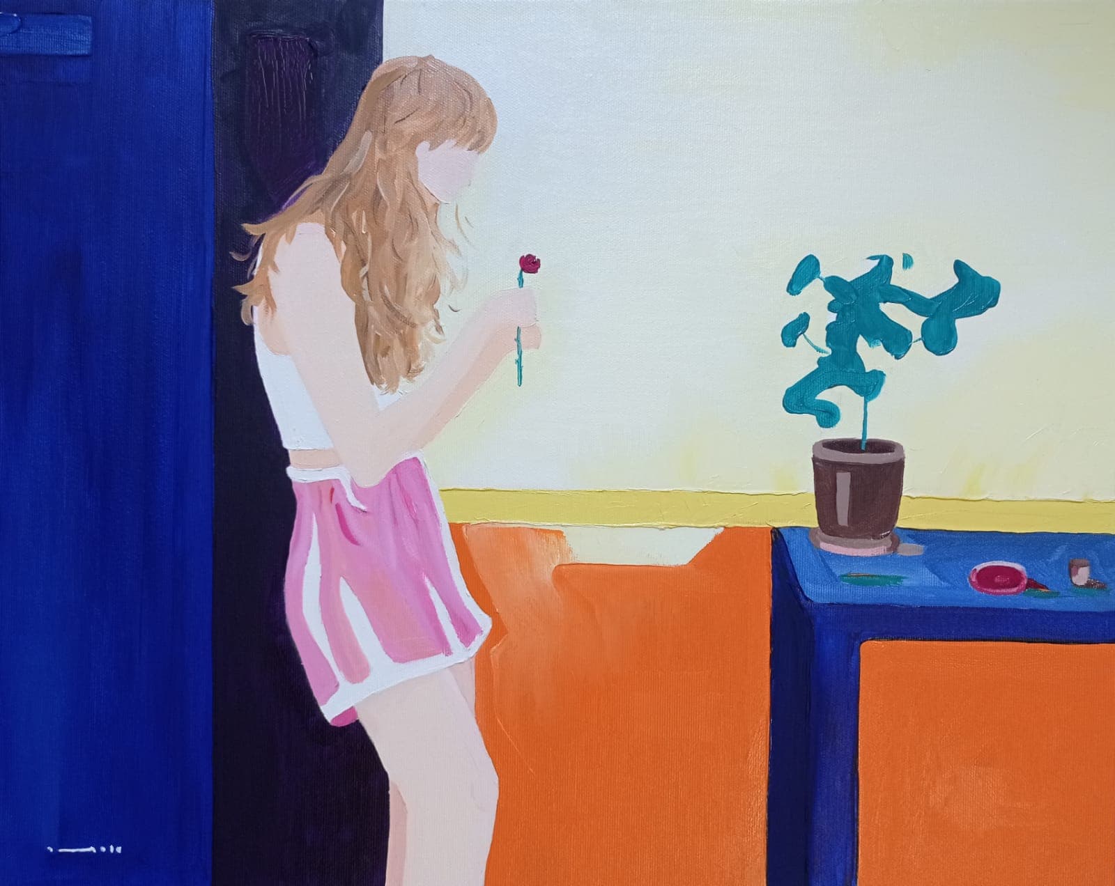 Esther, a girl holding a flower