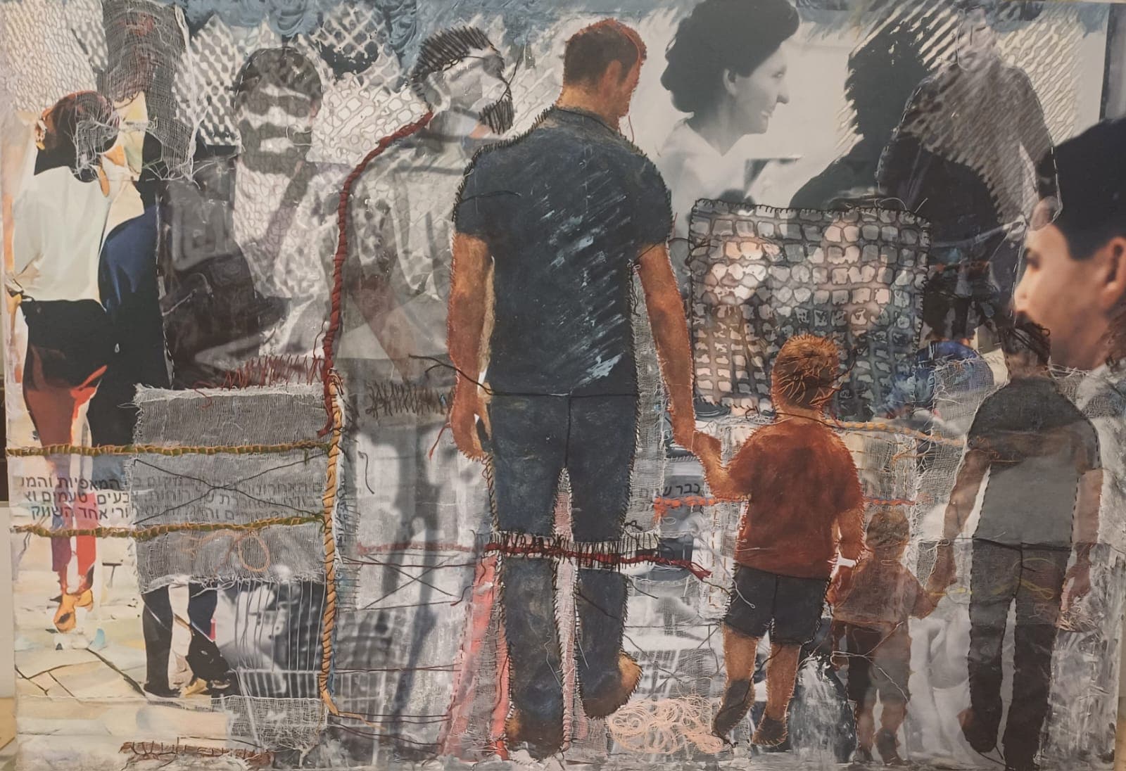 Father and son strolling among the market stalls and cafes